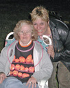 two women posing for the camera