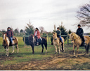 four riders on horseback