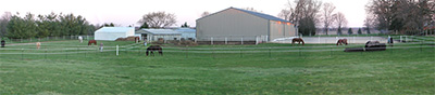 view of barns and pastures